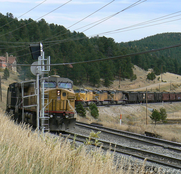 UP 6562 AC4400CW Rollinsville, Colorado
Union Pacific coal train prepares to take the main, as an eastbound of empties clears the signal - October 2007
Keywords: up;ac4400cw;rollinsville;co;coal