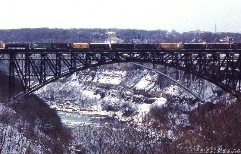 Suspension Bridge Niagara Falls NY
Westbound Chessie System (C&O) CG-41 crosses the Lower Niagara Gorge into Canada after making its pickup at Niagara Yard.  Just behind Suspension Bridge is the Whirlpool Bridge, which carries Amtrak's daily Maple Leaf in addition to vehicular traffic.
Photo Copyright 2008 Tim Baldwin
Keywords: suspension;chessie;c&o;niagara;gorge;canada;whirlpool;amtrak