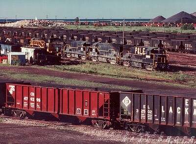 CR Ashtabula OH coal dock yard
A trio of P&LE U28Bs and a lone SW1500 are seen leaving Ashtabula with a southbound empty coal movement.  The yard is awash with color, as freshly painted Conrail hoppers mingle with those of various predecessor roads alongside P&LE hoppers in two different schemes.
Photo Copyright 2008 Tim Baldwin
Keywords: cr;ashtabula;oh;coal dock;yard;p&le