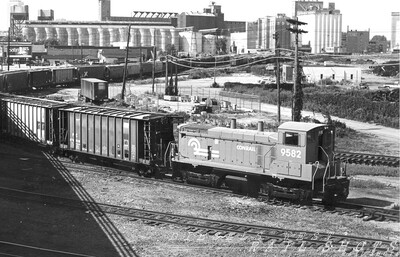 CR SW1500 #9582 Ohio Street Buffalo NY
In better days for the Great Lakes shipping industry, Conrail SW1500 #9582 works the grain elevators along Ohio Street in Buffalo's First Ward.
Photo Copyright 2008 Tim Baldwin
Keywords: cr;sw1500;ohio street;great lakes;cr 9582