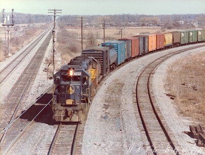 B&O GP40-2 #4032 Tuscarora Wye Niagara Falls NY
Westbound Chessie freight CG-41, led by GP40-2 #4032 in B&O blue, travels the west leg of Tuscarora Wye en route to Niagara Yard.  After making its pickup, NI-42 will continue west across Suspension Bridge to the former Pere Marquette line across Southern Ontario.
Photo Copyright 2008 Tim Baldwin
Keywords: b&o;gp40-2;tuscarora;niagara falls;ny;chessie;pere marquette