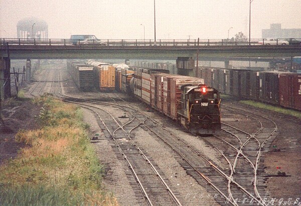 N&W Buffalo Junction Yard Elk St Buffalo NY
N&W C30-7 #8054 works the tight confines of N&W's Buffalo Junction Yard as viewed from the Elk St overpass in Buffalo NY.
Photo Copyright 2008 Tim Baldwin
Keywords: n&w;buffalo;junction;c30-7;elk;ny