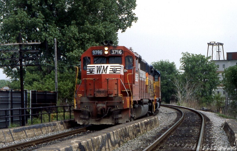 WM GP40 #3796 North Tonawanda NY
Railfans delight in the unexpected. Today's westbound CG-41 brought a rare treat as red and white Western Maryland GP40 #3796 rounds the curve above Goundry St in North Tonawanda en route to Niagara Yard. Sharp eyes will notice the improvised number board on the right side of the cab.
Photo Copyright 2008 Tim Baldwin
Keywords: gp40;wm;tonawanda;ny;cg-41;maryland;3796;goundry;niagara