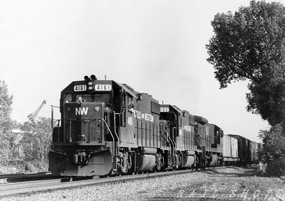 N&W GP38-2 #4161 on the "Wabash"
N&W GP38-2 #4161, along with sister unit #4160 and a rare Maroon and Gold C30-7 are viewed on the Howard Street runner approaching CP 437.  The train will proceed west on the Belt Line before crossing the International RR Bridge into Canada.
Photo Copyright 2008 Tim Baldwin
Keywords: n&w;gp38-2;wabash;canada