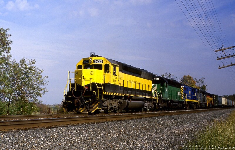 NYSW SD45 #3622 Alden NY
Westbound D&H EBBU is a rainbow of color with five different attractive paint schemes on a beautiful late summer day.  The train is led by freshly repainted ex-BN SD45 #3622, followed by ex-Frisco SD45 #6695, still in Cascade Green, a D&H Alco C424M, and two CSX units, one still attired in Chessie System colors.  NYS&W's aggressive marketing, coupled with friendly connections with CSX, NS, and the newly formed B&P would breath new life into the Guilford castoff.
Photo Copyright © 2008 Tim Baldwin
Keywords: sd45;nysw;alden;ny;d&h;frisco;c424m;chessie