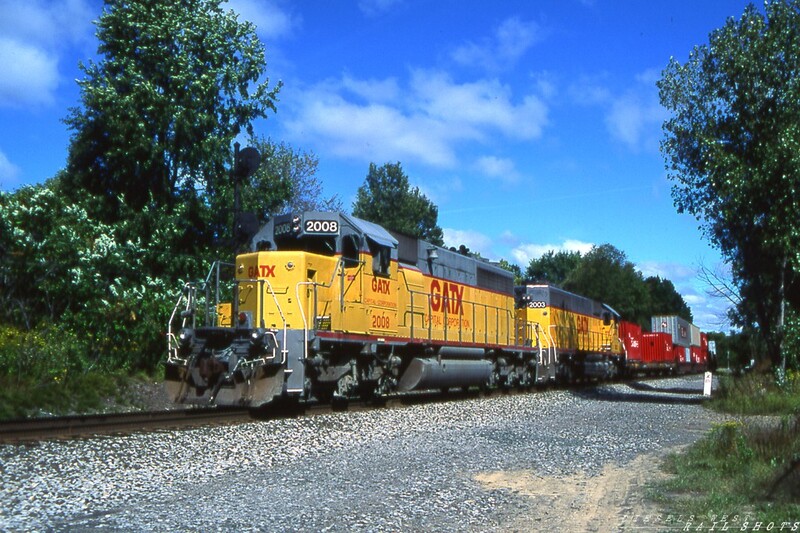 GATX SD40 #2008 Rock Glen NY
A CP/D&H K-Line stack train roars east through Rock Glen NY on a warm summer day.  The train is powered by two leased ex-UP GATX SD40s, #2008 and #2003.
Photo Copyright © 2008 Tim Baldwin
Keywords: sd40;gatx;2008;rock glen;ny