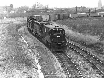 N&W C30-7 #8021 entering Buffalo Junction Yard
Following the closing of Bison Yard, N&W moved their operations to the smaller Buffalo Junction Yard, located west of D&H's SK Yard and east of Conrail's CP Draw.  The Seneca Street bridge was an excellent spot to view the action as C30-7 8021 leads the way into the yard with cars picked up from the D&H.  Buffalo's Central Terminal can be seen in the upper right corner.
Photo Copyright 2008 Tim Baldwin
Keywords: n&w;c30-7;bison yard;buffalo;d&h