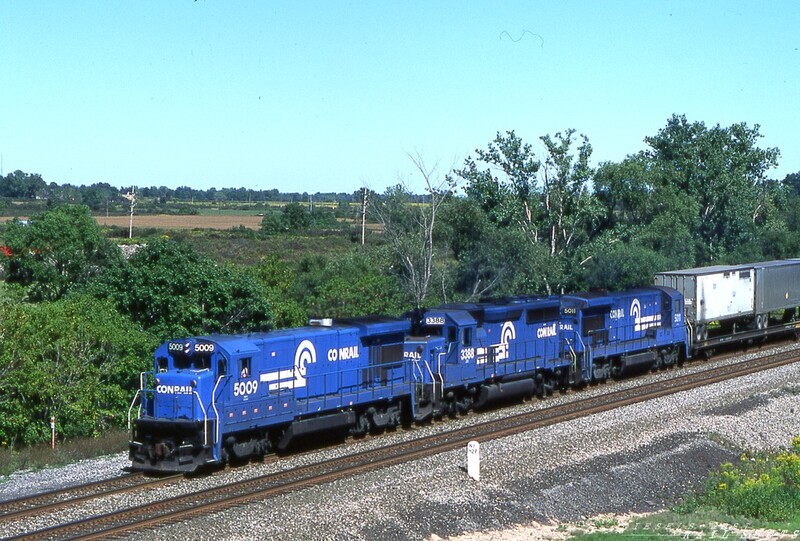 No Defects
One of many daily Westbound TV trains passes the dragging equipment detector at Milepost 427 in Lancaster NY.  A pair of Conrail B36-7s sandwich a GP40-2, with #5009 in the lead.
Photo Copyright © 2008 Tim Baldwin
Keywords: conrail;cr;b36-7;tv;lancaster;ny