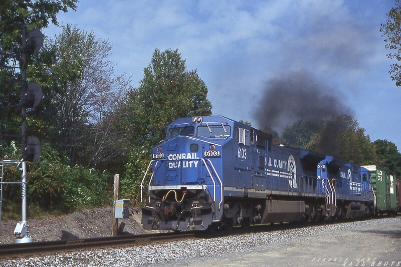 Smoke gets in your eyes
CW40-8 #6103 and cousin C40-8 #6031 smoke it up through CP Rock Glen on the Southern Tier Line between Warsaw and Silver Springs NY as they lead Conrail freight BUOI east.  The train will stop at the Morrison_Knudsen facility in Hornell to pick up a string of flats loaded with refurbished commuter rail cars before entering the scenic Canisteo River Valley.
Photo Copyright © 2008 Tim Baldwin
Keywords: conrail;cr;cw40-8;c40-8;rock glen;southern tier;warsaw;silver springs;ny;smoke