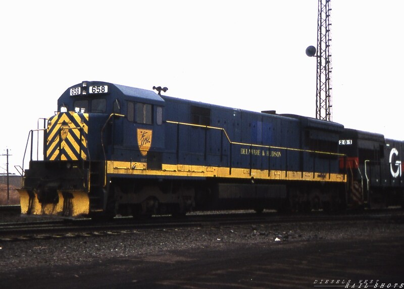 D&H U33C #658 SK Yard Buffalo NY
Six-axle D&H power was rarely seen east of Binghamton.  D&H U33C #658 makes a surprise appearance on a gloomy November day at SK Yard in Buffalo NY, accompanied by MEC #281, a former D&H U23B now dressed in Guilford colors.
Photo Copyright © 2008 Tim Baldwin
Keywords: d&h;u33c;buffalo;sk yard;binghamton;guilford