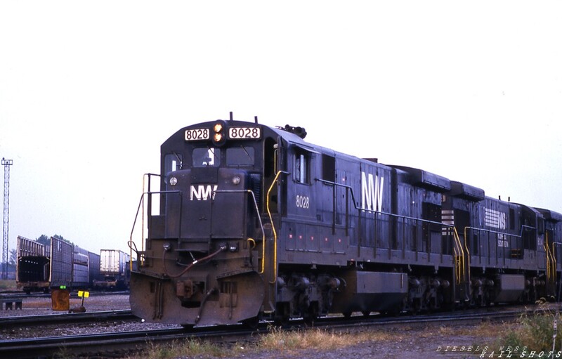 N&W C30-7 #8028 SK Yard Buffalo NY
N&W C30-7 #8028 still wears basic black, while her sister unit has opted for slightly fancier attire.  They are seen making a setout at Delaware and Hudson's SK Yard in Buffalo NY.
Photo Copyright © 2008 Tim Baldwin
Keywords: n&w;c30-7;sk yard;buffalo;ny;d&h