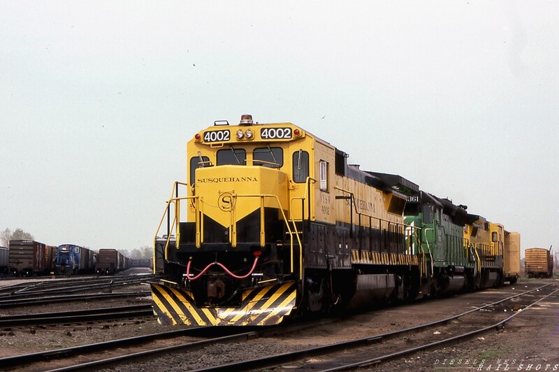 NYSW B40-8 #4002 SK Yard Buffalo NY
NYSW B40-8 #4002, along with an ex-BN SD45 and a sister unit, lays over at SK Yard in Buffalo NY between runs.  In the background, a Conrail switcher arrives with interchange traffic.
Photo Copyright © 2008 Tim Baldwin
Keywords: b40-8;nysw;sk yard;buffalo;ny