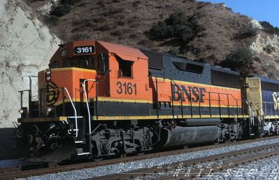 BNSF EMD GP50L #3161
BNSF EMD GP50L #3161, I choose to call them by the reference most people give to the original BN units IE GP50L, these had cabs capable of carrying a 5-man crew. photographed on 14th October 2000 at Yorba Linda, California by Paul Webster. Scanned from an original Kodachrome slide now in my personal collection
Keywords: bnsf;gp50l;yorba linda