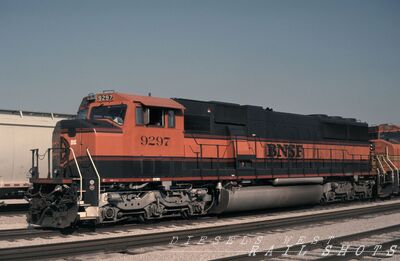 BNSF EMD SD60M #9297 "The Great Pumpkin"
BNSF EMD SD60M #9297 nicknamed "The Great Pumpkin" a one-off experimental livery, date of photograph unknown but taken in the Kansas City Area by Lon Coone, scanned from an original Kodachrom slide now in my personal collection
Keywords: bnsf;sd60m;kansas city