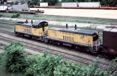 CNW EMD TR2A 66A + 66B
CNW EMD TR2A #66A + #66B from slide taken 12th June 1979 at E St. Paul, Minnesta by Allan Ramsey, from an original Kodachrome slide now in my collection
Keywords: cnw;tr2a;st. paul;minnesota