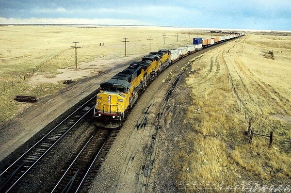 Climbing Sherman
Taken out west in Wyoming, on I-80, just a few years ago, on vacation - led by UP SD60M 6103
Keywords: sherman;wyoming;sd60m;vans