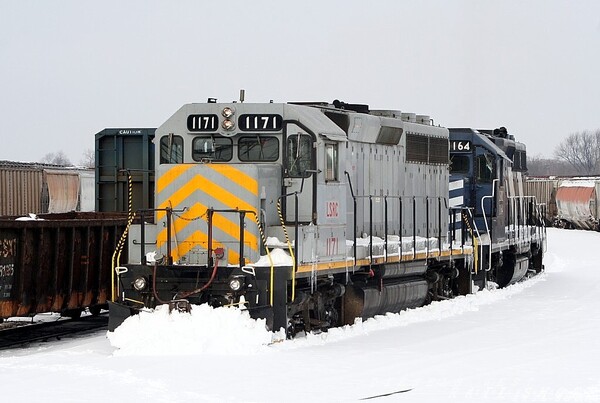 Clearing the Yard
After a heavy snow fall this past spring, two of our GP40M-3 help clear yard track, prior to their departure to Flint
Keywords: gp40m-3;snow;flint