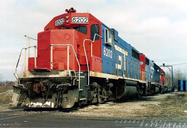 GTW 6202 - GP38
An ex-DT&I unit, repainted in GTW colors, sits with two sisters at Port Huron, Mi, ready for their call to head west
Keywords: gtw;gp38;dt&i;port huron;mi