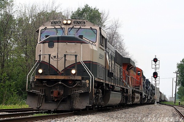 BNSF 9706 on Z127
Coal Power being returned on the 19th of July, on the Z127 to Flint Mi.  This train was over 9100 feet long, and over 17000 tons
Keywords: bnsf;bn;sd70mac;coal;flint;mi