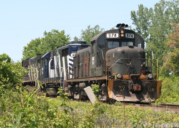 LSRC 974 - RS3m
Now out of service due to damage incurred in a derailment, the 974 sits on a stone train near Linwood, MI, last summer
Keywords: alco;974;rs3;linwood;mi