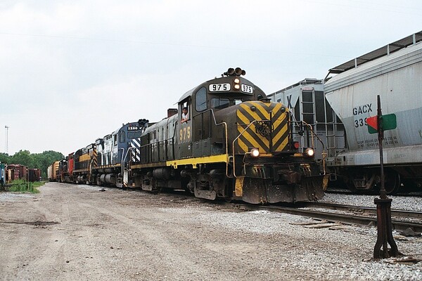 Ready to Pull
A miss-matched set of Alco's gets ready to pull N. Bay City yard, for their nightly trip north towards Alpena
Keywords: alco;bay city;mi;alpena