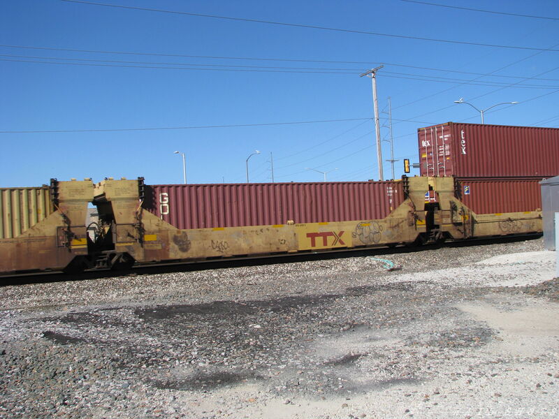 DTTX 63123 5x40
DTTX 63123 5x40 Double Stack Well Cars D east bound through Garner, Kansas on 9/21/2014
Keywords: dttx;well;container;double stack;40;garner;kansas;ks