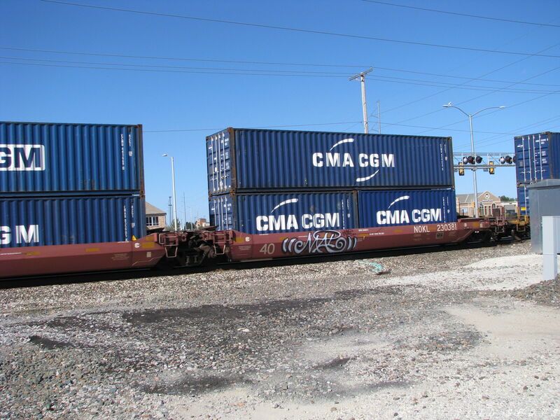 NOKL 230381 3x40
NOKL 230381 3x40 Double Stack Well Cars B & C east bound through Garner, Kansas on 9/21/2014
Keywords: nokl;well;container;double stack;40;garner;kansas;ks