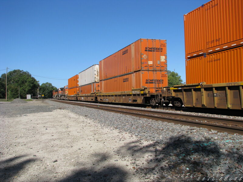 DTTX 729327 3x53
DTTX 729327 3x53 Double Stack Well cars with 6 Schneider 53 foot containers moving through Edgerton, Kansas on 9/21/2014.
Keywords: dttx;well;container;schneider;53;edgerton;kansas;ks