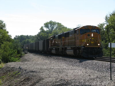 BNSF Empty Coal Drag
BNSF 8953 and 9844 east bound with an empty KPLX (Kansas Power and Light) coal train just east of Edgerton, Kansas on 9/21/2014
Keywords: BNSF;sd60m;coal,kansas