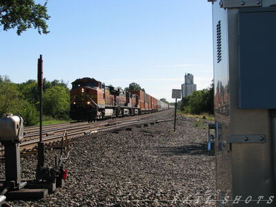 BNSF WB Double Stack
BNSF 5318, 992 and 4584 west bound on the TransCon running through Edgerton, Kansas on 9/21/2014 with a solid train load of domestic containers. 
Speed limits in this area are limited to 65 mph for the most part
Keywords: BNSF;dash 9;containers,kansas