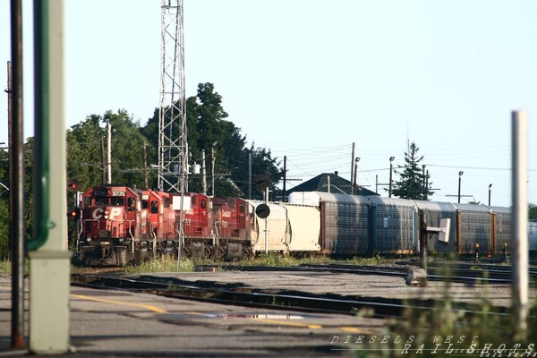 Train 234
Arriving from Toronto with a crew change then onto Montreal. Power CP 5736,5912(SD40-2's),9668,9663(AC4400CW's) the two GE's where on idle.
Taken at Smiths Falls August 04,2008
Keywords: toronto;sd40-2;ac4400cw;cp;autorack;smith falls