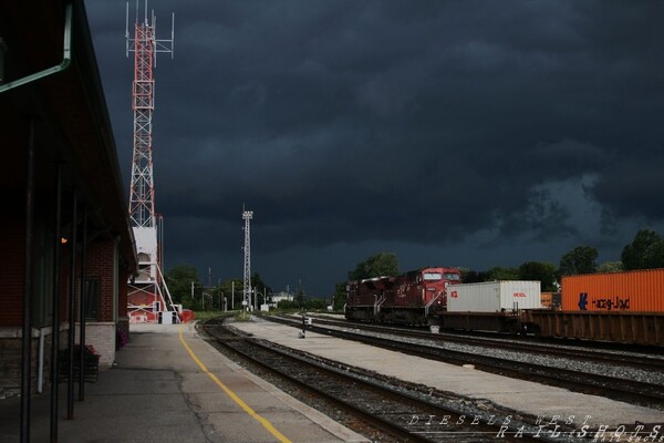 Dark at 4.53pm
This photo was taken just seconds before the downpour...CEFX106(SD9043AC) & CP9502(AC4400CW)
Aug 18,2008 at 4.53pm Smiths Falls Ontario
Keywords: smith falls;cp;cefx;ontario;night;dusk