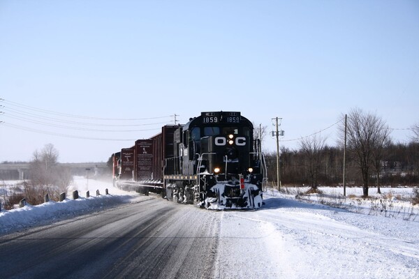 OCR/CN # 537 CN9455 OCR1855(RS18)
Train 537 eastbound from Kott lumber (Ottawa Ontario) this was the last trip to Kott for OCR 1859. CN took this line back at the end of October
Keywords: rs18;ottawa;kott;ontario;snow