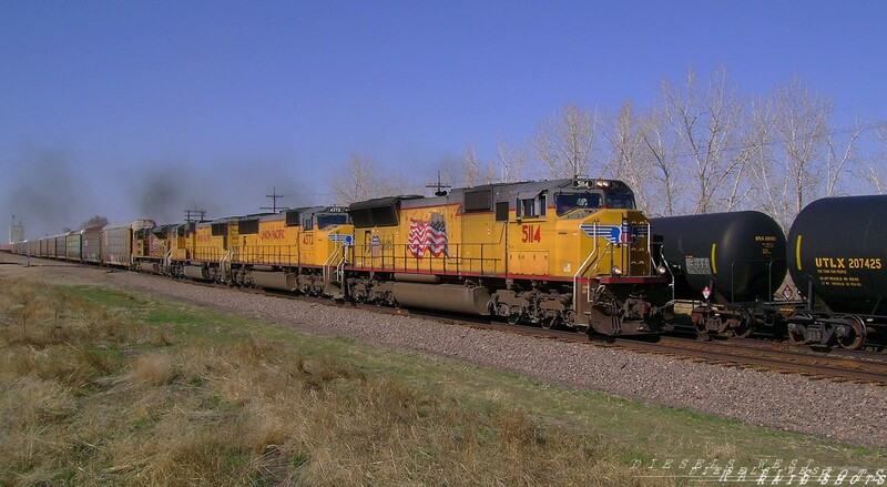 Racing Through Platteville...
UP 5114(SD70M) is seen racing through Platteville, Colorado, on the ZLADV 10, Los Angeles, California to Denver, Colorado Z-Train, while passing the MNYNP 13.
Copyright 2008 By Denver_Zephyr
Keywords: sd70m;up;platteville;colorado