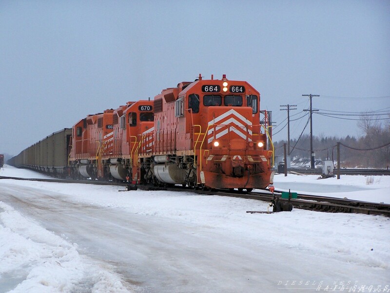 EJ&E 664 at Eola Yard
Sitting at BNSF Eola yard waiting for a highball is a trio of EJ&E SD38-2's with a just arrived coal train from Wyoming and headed towards Joliet, Illinois
Keywords: sd38-2;eola;ej&e;wyoming;joliet;illinois