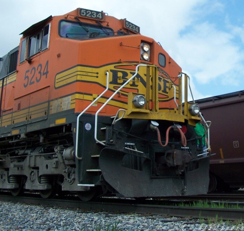 BNSF Dash 9 # 5234
In Abilene, the BNSF yard is right across from our church...The Dash 9's horn was 'preaching' louder than Father Andrew today while making up the Courtland bound grain special..
Keywords: bnsf;dash 9;abilene;tx;yard;courtland