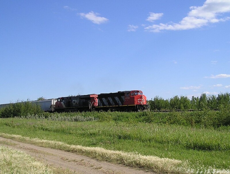 The Odd Couple
CN units 4798 and 4703 left town leaving CN 4782 all alone. But not to worry, it seems CN 2257 was lying around, so the 4782 needn't be alone no more. On August 6 2008, CN 520 'Diverges to clear' at Riverview, with one of the most bizarre consists ever to grace the train, except for the Dash-9/GMD1 setup. Why the GEVO isn't up front, is beyond me
Keywords: gp38-2w;cn;es44dc;saskatoon;riverview