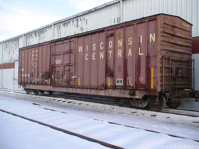 Wisconsin Central
WS boxcar sitting at an industry siding getting rolls of paper unloaded from it.
Keywords: wisconsin;boxcar;paper