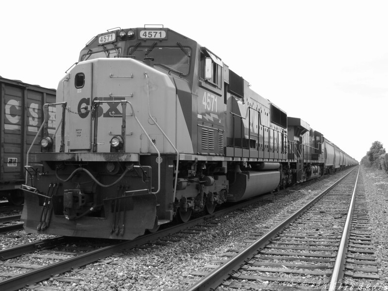 CSX SD70MAC #4571
CSX SD70MAC #4571 sits at CSX Oliver Transfer Yard in Indianapolis as it waits for a crew to take her on her journey. It has been here for about a day or 2 just sitting tied down. It was great to see a MAC still in YN2.', 'CSX, SD, EMD, SD70MAC, Indiana, Indianapolis, train
Keywords: csx;sd70mac;oliver;yard;indianapolis;indiana