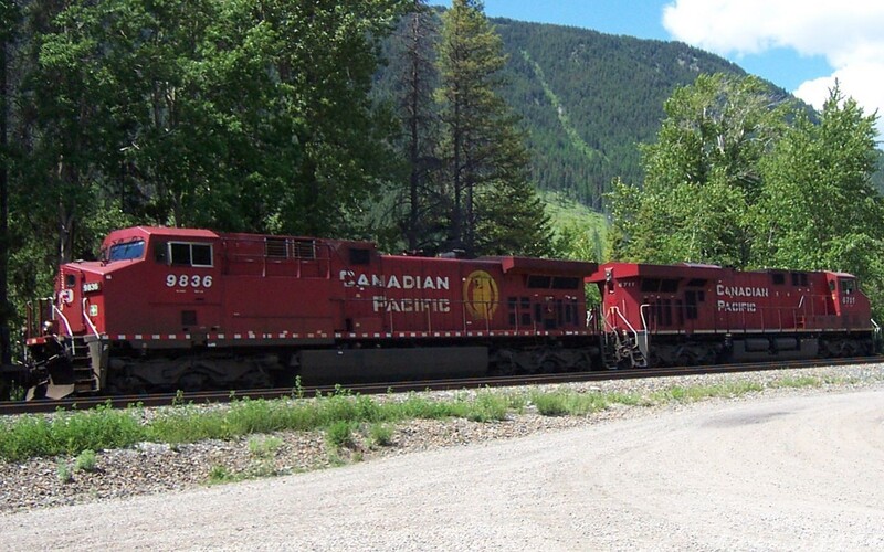 Canadian Pacific AC4400CW #9836
Trailing CP's ES44AC #8711 lead loco, Canadian Pacific AC4400CW #9836 is second in line to pull 114 empty coal gondolas northward up the Elk Valley of British Columbia, Canada. The Rocky Mountains provide a majestic background for these mighty machines.
Keywords: ac4400cw;cp;9836;es44ac;coal;rocky mountains;elk valley