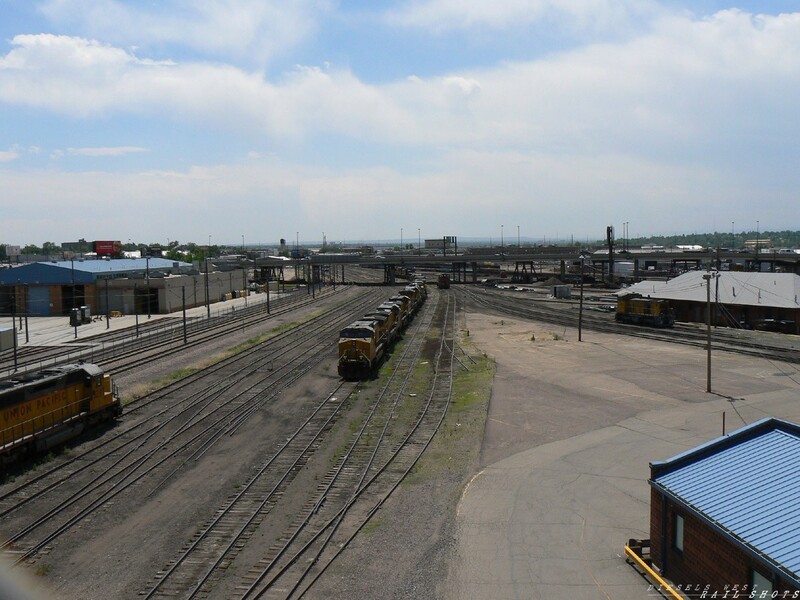 U.P.'s Burnham Shops(yard) - Denver
U.P.'s Burnham Shops(southern half - looking south)- June 17, 2008 Now a U.P. maintenance facility, this yard and shops were once the headquarters of D&RGW's Mechanical Department in Denver. It was built in 1870's, and serviced narrow gauge equipment. The Burnham Shops eventually became known as one of the best in the country. 

This U.P. shop continues to do everything from full maintenance to complete rebuilds and modifications of their locomotives. The tracks on the right lead to the turntable, load-testing, and the shops. The tracks below are generally used as storage for retired equipment.
Keywords: up;burnham;shops;drgw;mechanical