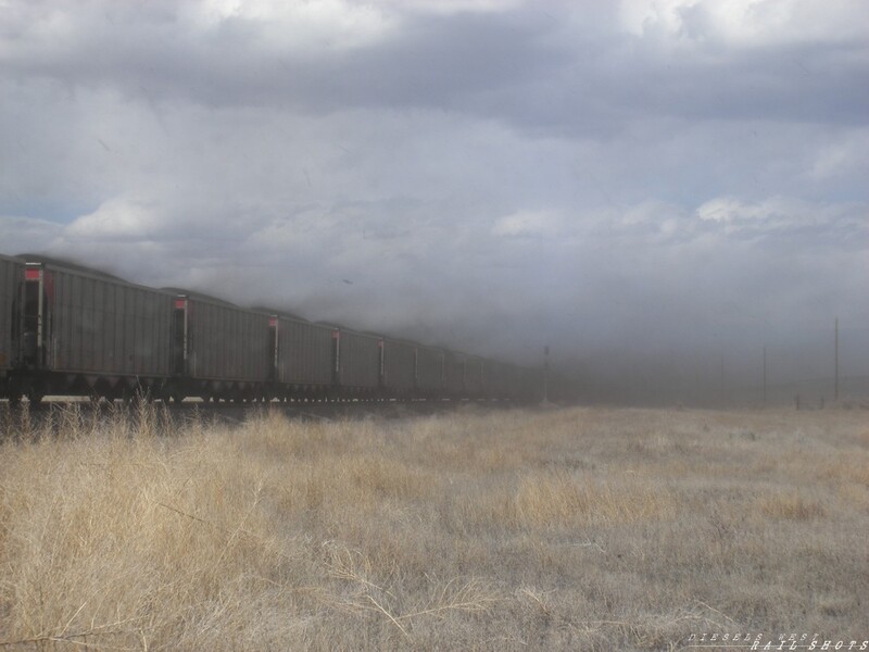 Coal Dust in the wind
...even 100 miles from the coal mines the coal dust still billows from the hoppers... the wind howling and the train moving makes for quite a show (cough, cough) April, 2008
Keywords: coal;coal train;hoppers;sd;dust;wind